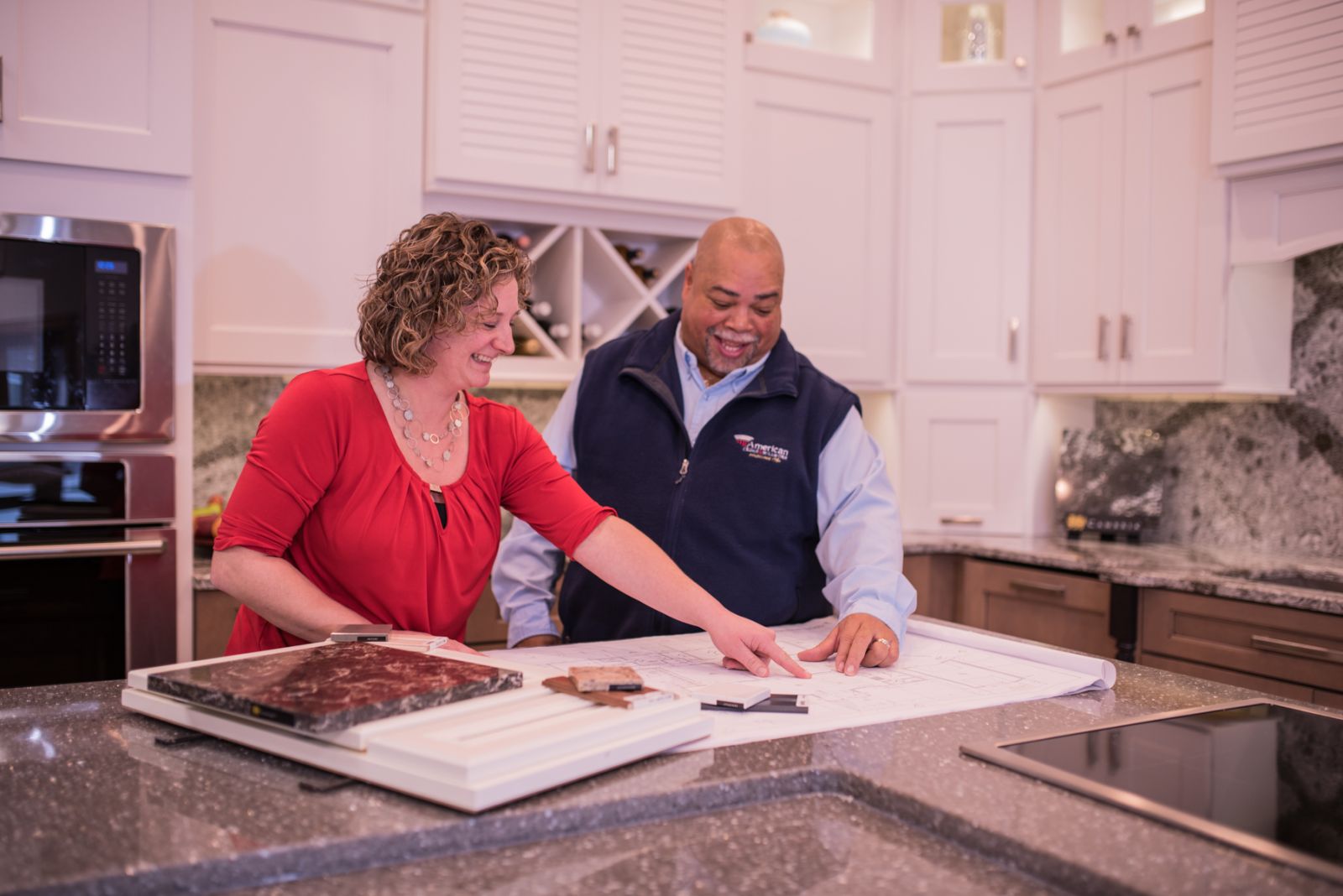 Reviewing kitchen design with American Cedar Designer